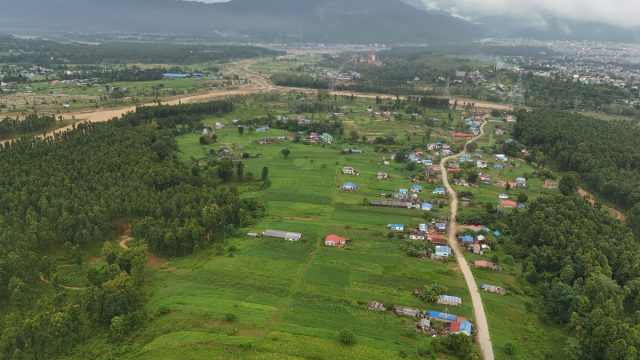 Aerial view of green fields and village in Nepal